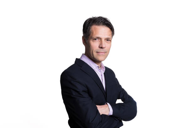 istock Middle-aged man smiling at the camera, on white background, wearing formal clothes. 2194776613