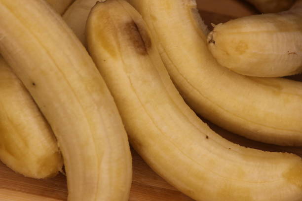 istock Close up of bananas without peel 2194780021