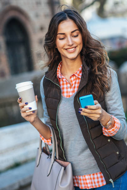 istock Texting in the city 2194792987