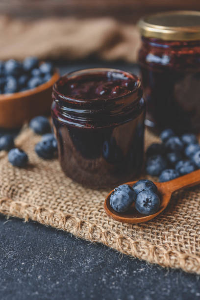 istock Delicious organic blueberry jam on dark background 2194793080