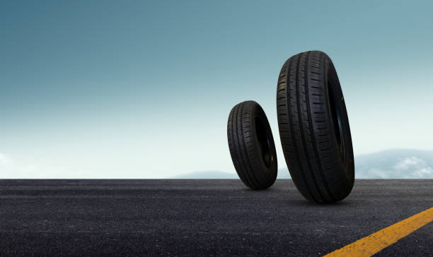 istock Stack of Tires on an Empty Road with Blue Sky Background 2194793148