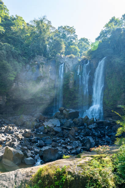 istock Majestic Waterfall Cascading in Lush Forest 2194797306