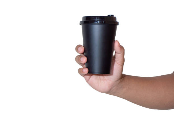 istock Hand holding black paper cup over white background. 2194802776