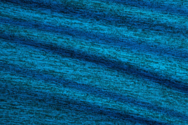 blue cyan fabric cloth with dark grain seamless background