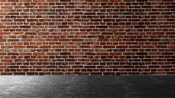 istock Red wall with black floor. Abstract pattern of a brick wall and floor. Mockup. Copy space. Wallpaper or texture background 2194805207