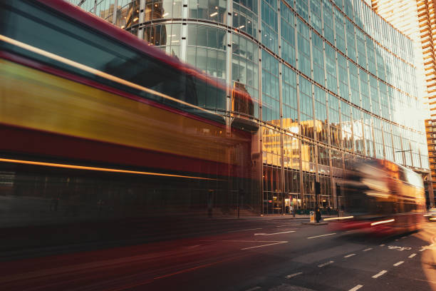 Double decker buses zoom past camera using long exposure technique