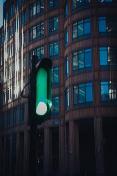 istock Long exposure of traffic light - green light streak 2194809565