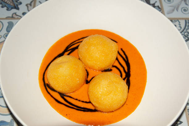 istock Parmesan Spheres in Roasted Pepper Sauce 2194811426
