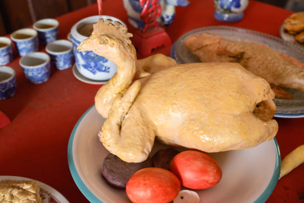 Fake whole boiled chicken made by hand, traditional Chinese foods on the altar for worship, food replicas