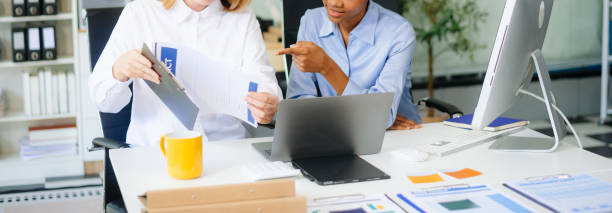 istock Team work process. Photo young business crew working with new startup project. Project managers meeting 2194814444