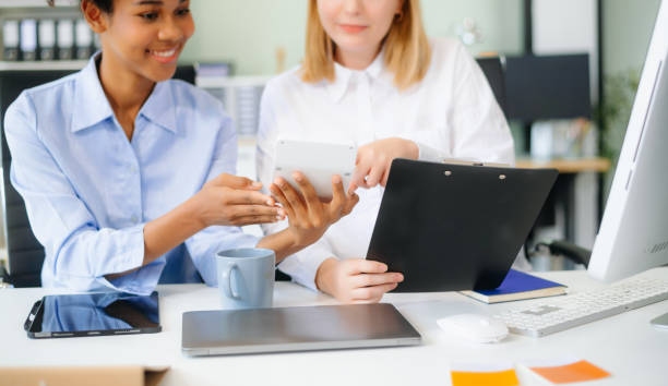 istock Team work process. Photo young business crew working with new startup project. Project managers meeting 2194814458
