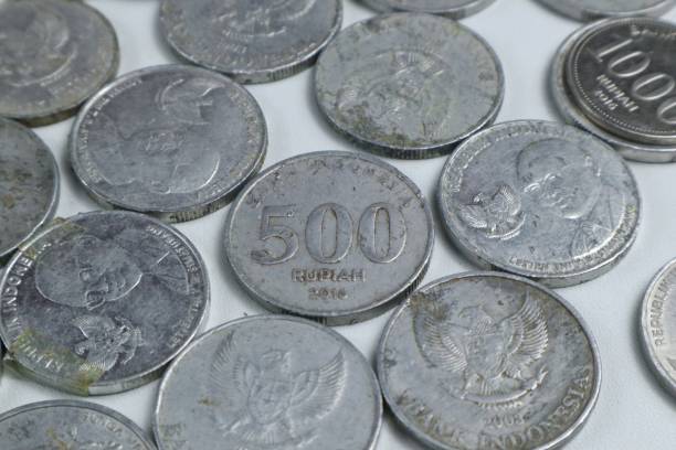 istock Indonesian coins isolated on white 2194814957