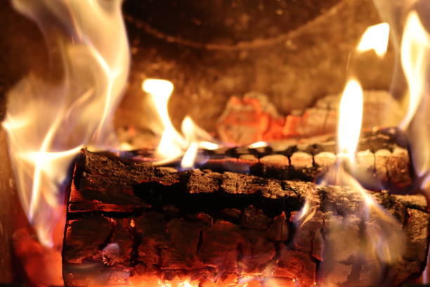 istock Close up of flames on logs in a fireplace 2194816812