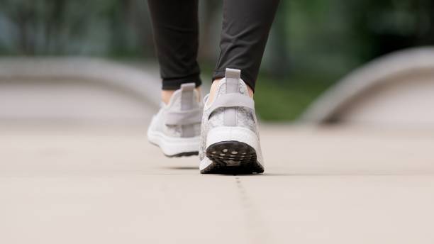 istock Feet of a walking woman 2194817063