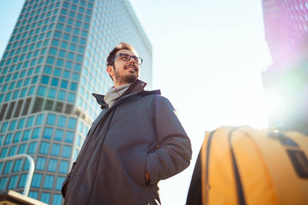 istock Businessman exploring the Osaka city with backpack. 2194818119