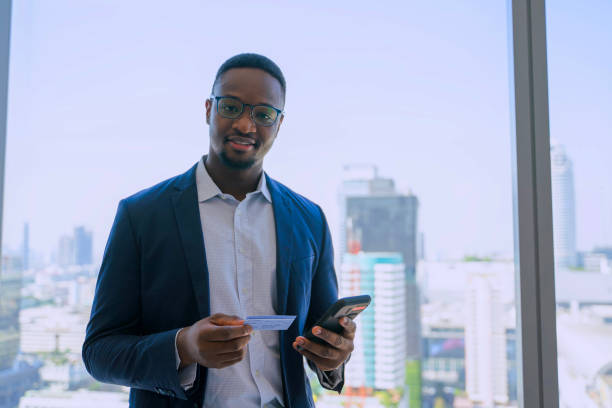 istock Business man is taking a break and play smart phone. 2194818152