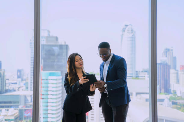 istock White collar workers are working at high rise building office. 2194818188