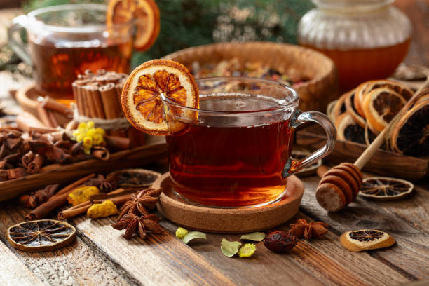 istock Christmas herbal tea with ingredients on a old wooden table. 2194818356