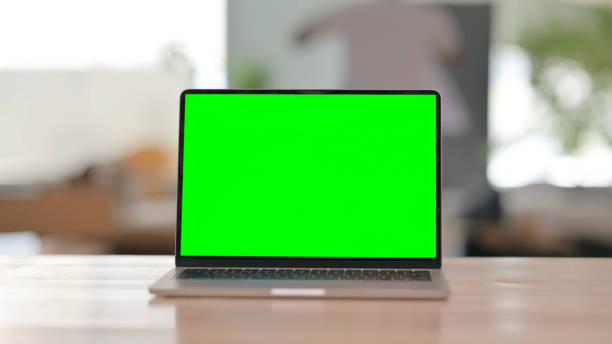 istock Laptop with Green Screen on Desk 2194821833