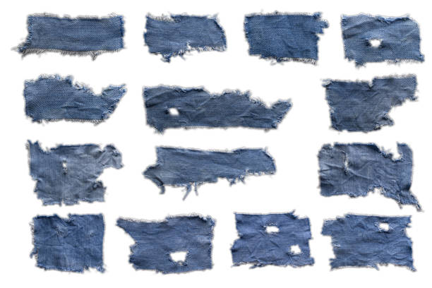 jeans. a frayed and torn piece of denim rag