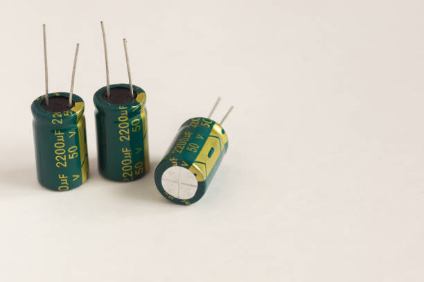 istock Isolated capacitor, used in electronic device. Electronic parts concept. 2194823028