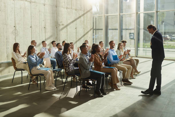 istock Applauding on an education event in board room! 2194824408