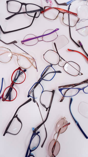 istock Assortment of broken optical eyeglasses, broken hinges, missing lenses 2194825274
