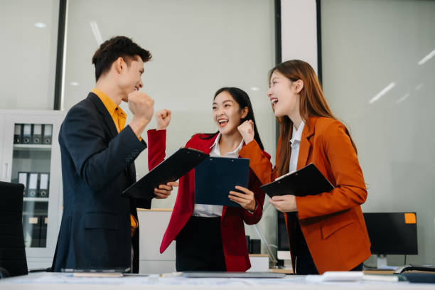 istock Happy smiling businessman feel happy work complete Teamwork success, success at work in the office concept. 2194826304