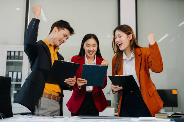 istock Happy smiling businessman feel happy work complete Teamwork success, success at work in the office concept. 2194826308