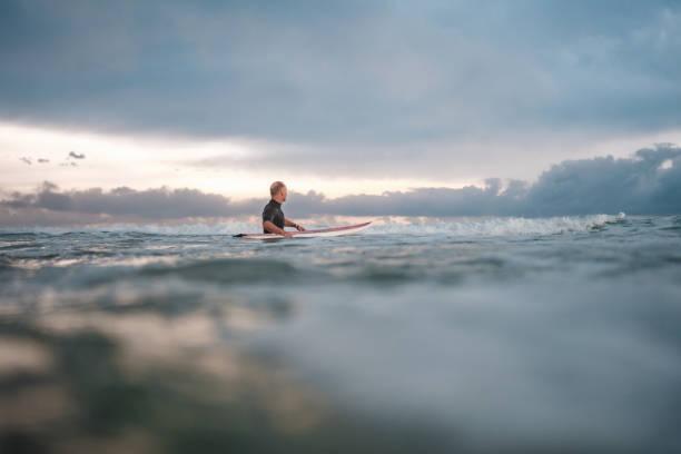 istock Determined Male Surfer Riding Gold Coast Waves 2194826707