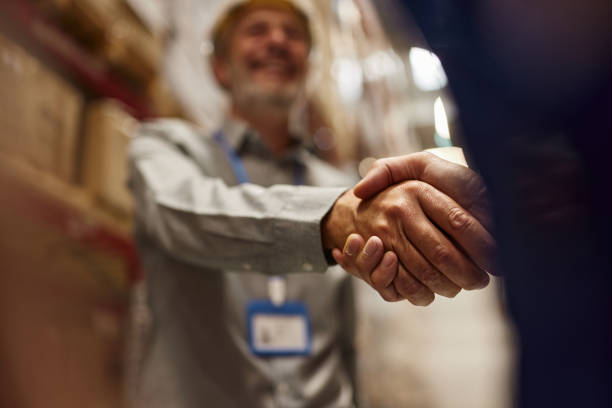 istock Successful deal among worker and manager in storage room! 2194826758