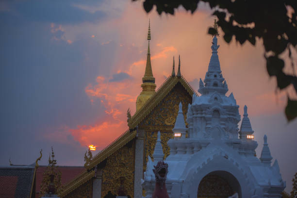 The last light sunset of Wat Phra That Hari Phun Chai Lamphun Thailand