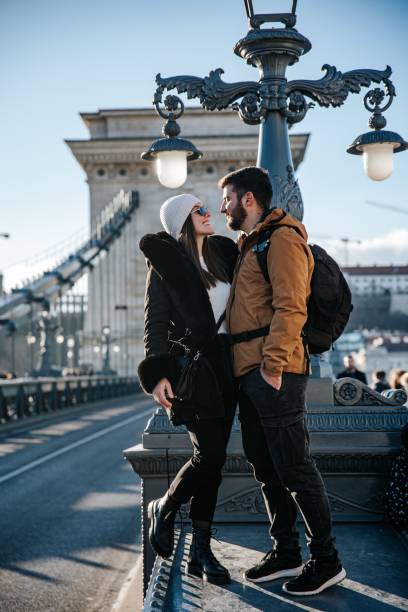 istock Romantic couple on a historic Budapest bridge. 2194829828
