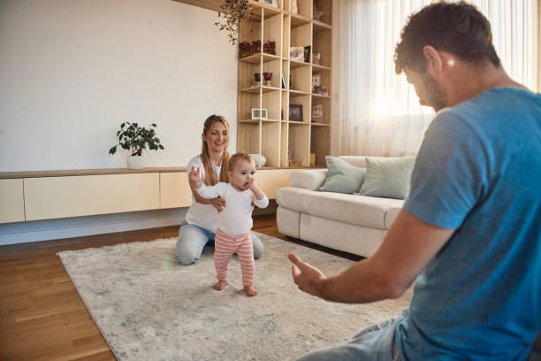 istock First steps of our baby 2194832351