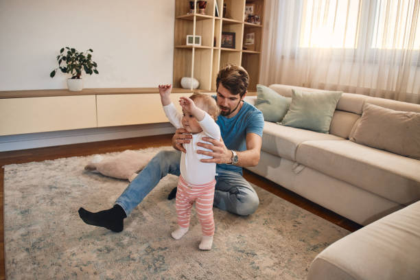istock First steps of my baby 2194832452