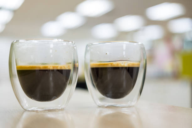 istock Double walled glass coffee mug with hot Americano 2194835838
