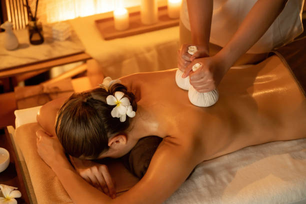 istock Hot herbal ball spa massage body treatment. Quiescent 2194837714