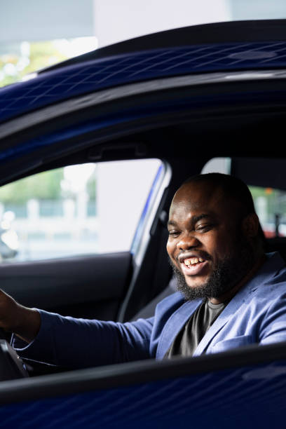 istock Overjoyed client deciding to buy car after finishing test drive 2194838163