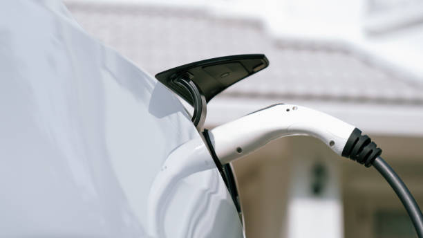 istock Electric vehicle technology utilized to home charging station. Synchronos 2194839777