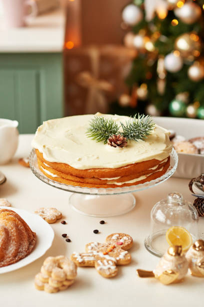 istock Christmas cake and sweets on table. Christmas decorations with lights background. Happy New Year! Christmas greeting card. Winter card template. Xmas concept. Holiday Banner. Feast of Nativity. 2194843360
