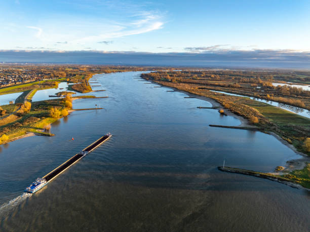 istock Ship on the river Waal during autumn sunrsie seen from above 2194845037