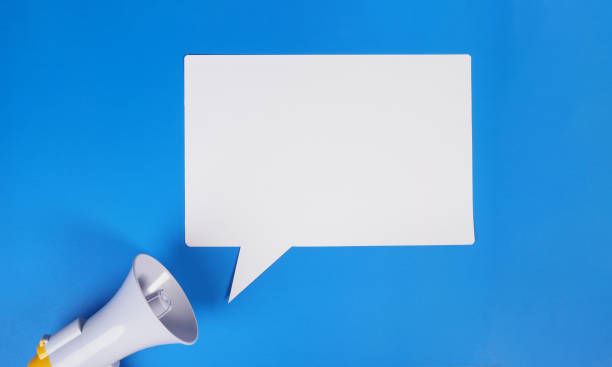 istock Blank A4 paper and megaphone on blue background. 2194846390