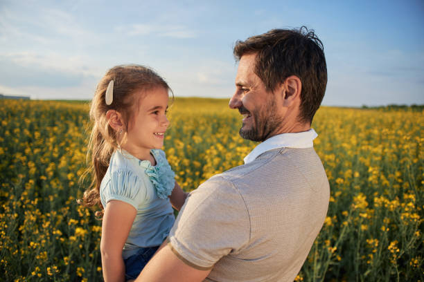 istock Father and daughter enjoying nature 2194846454
