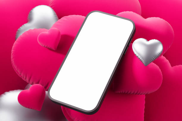 istock Smartphone mockup with blank display surrounded by pink and silver heart shapes. 3D Rendering 2194846560