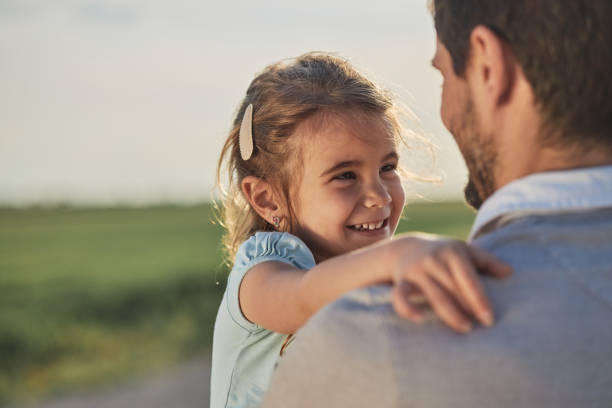 istock Father and daughter enjoying nature 2194847157