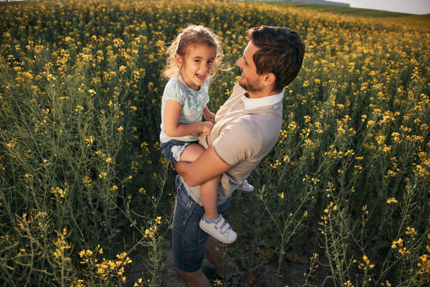 istock Father and daughter enjoying nature 2194847174