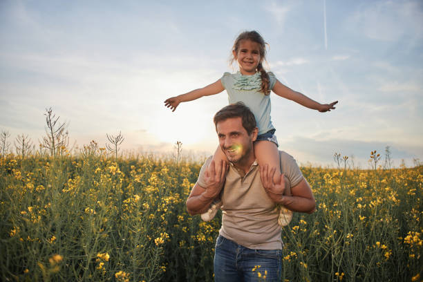 istock Father and daughter enjoying nature 2194847316