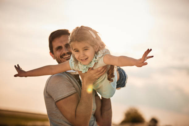 istock Father and daughter enjoying nature 2194847369
