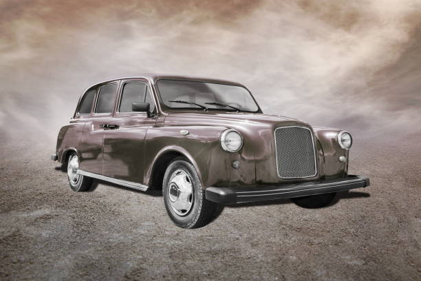 istock old car stands on sepia clouds background 2194847639