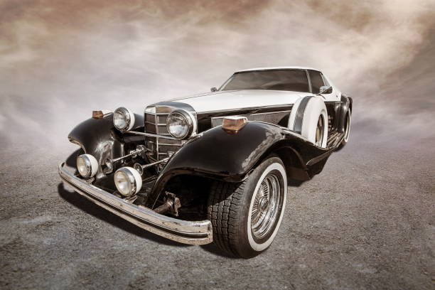 istock old car stands on sepia clouds background 2194847641